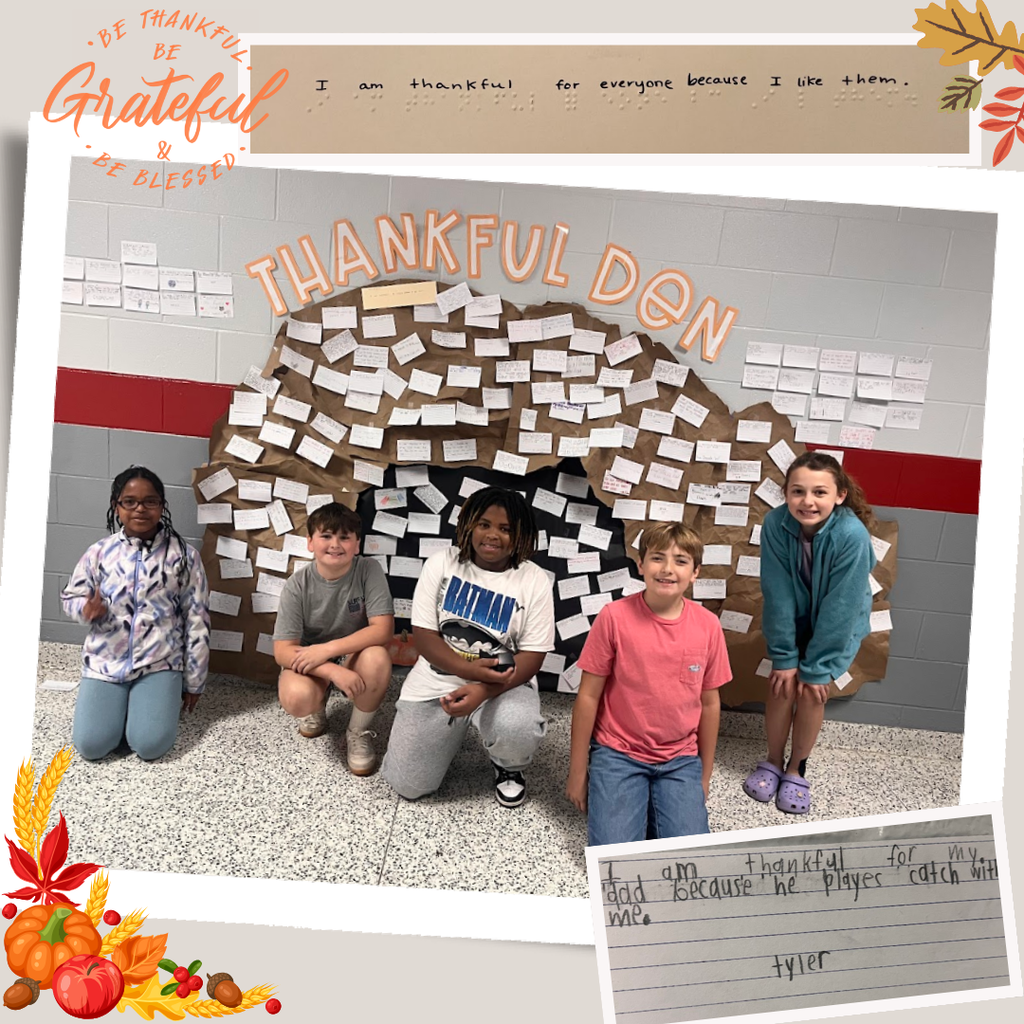 This picture includes 5 of our Renaissance team members, 3 boys and 2 girls, standing in front of the Thankful Den display in the hallway. The display includes a brown paper cave with notes taped to it with the heading "Thankful Den" above it.