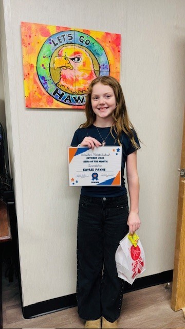 6th grade Student of the month Kaylee Payne with certificate