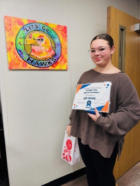 Special Area student of the month Leni Moore with certificate