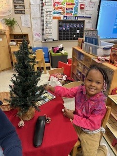 Girl with Christmas tree