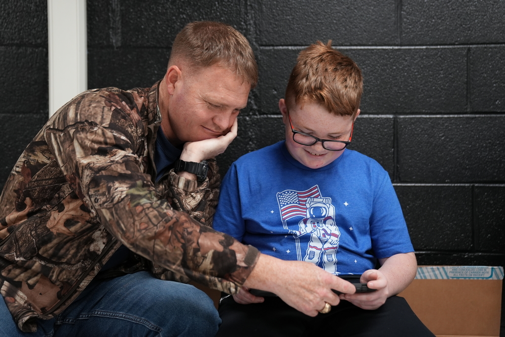 parent and son editing video clips