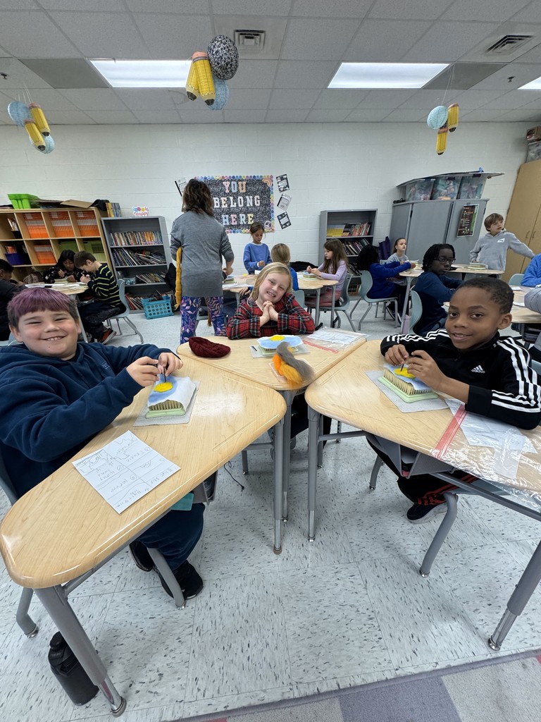 Students began with a plan that they followed as the put their pictures together.