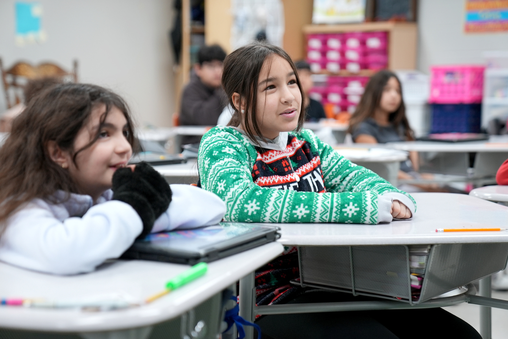 students listening to presentation