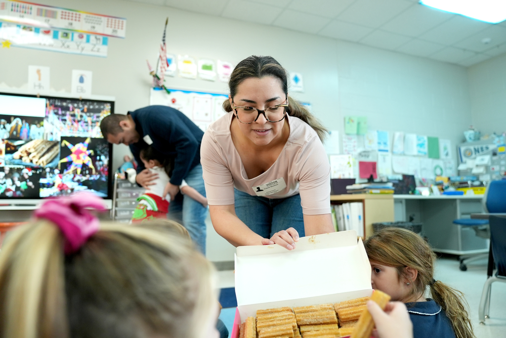 mom handing out churros