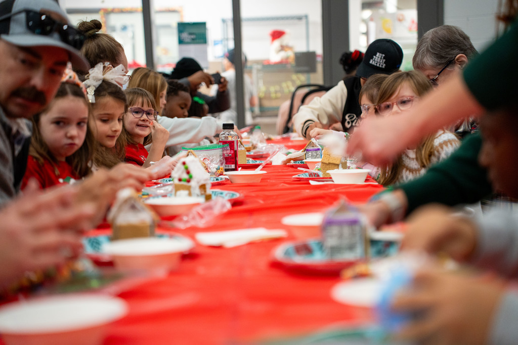 students making gingerbread houses