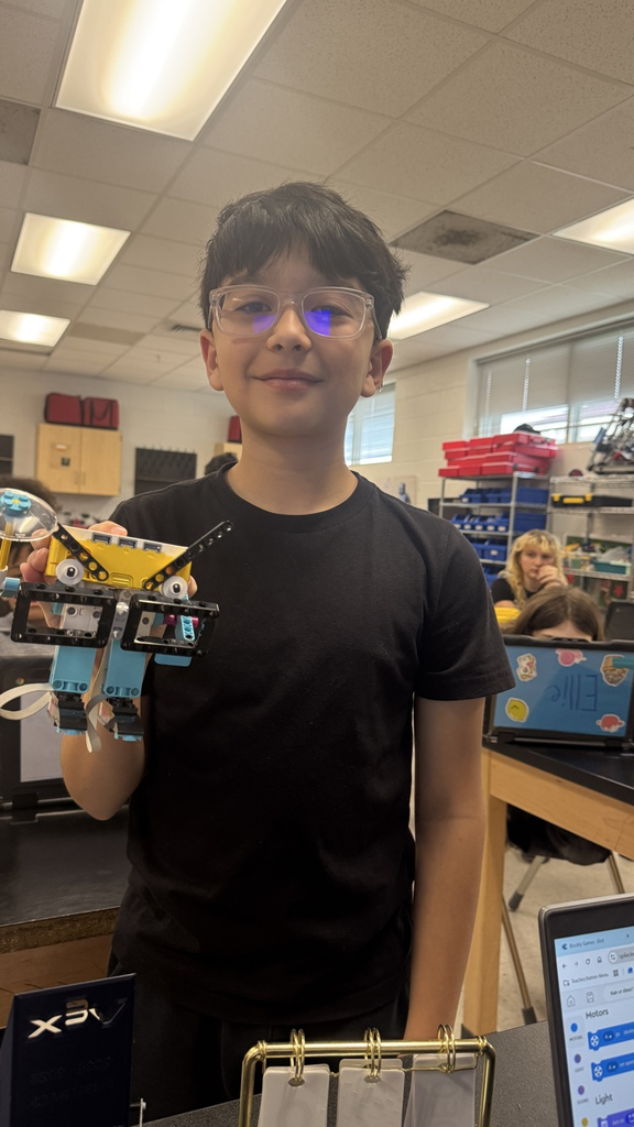 kids holding Lego weather trackers