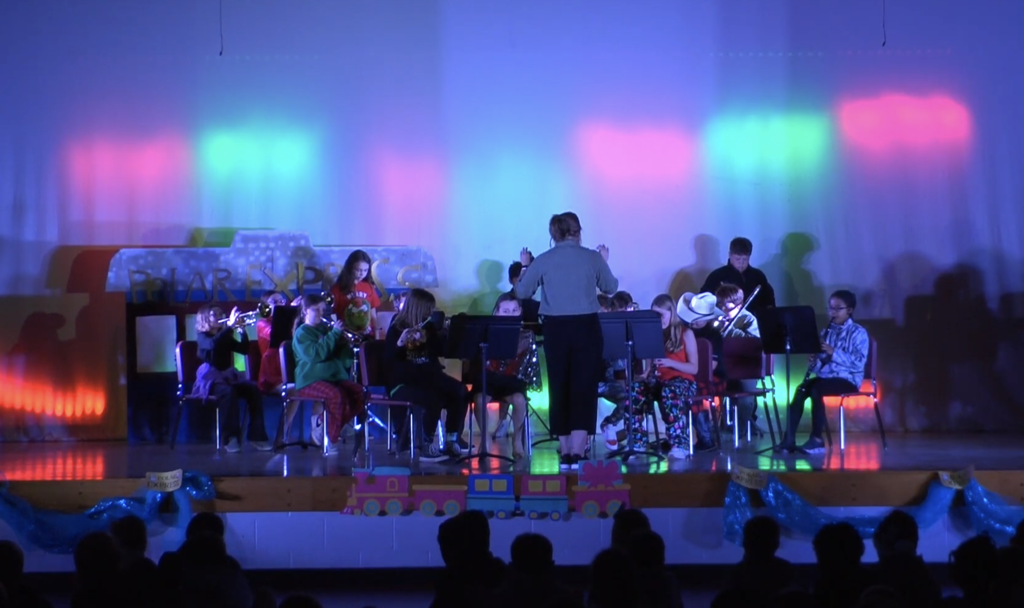 Students playing band instruments