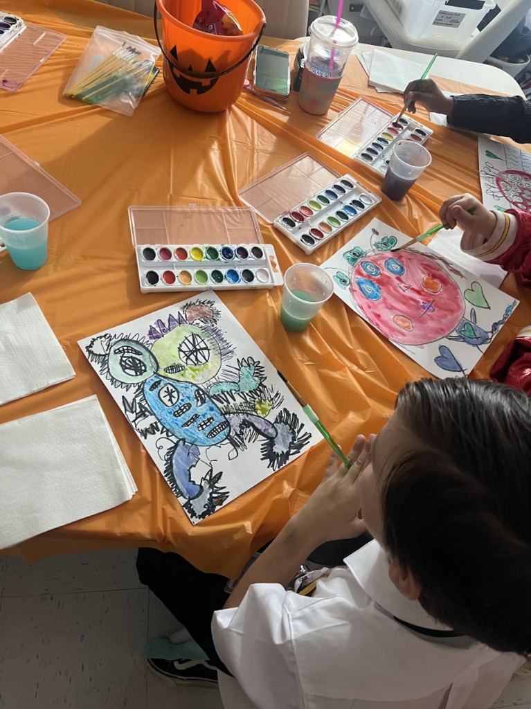 Students working on watercolor painting