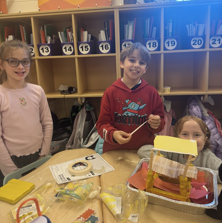 students building a model house 