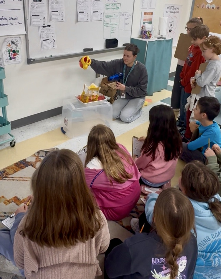 students building a model house 