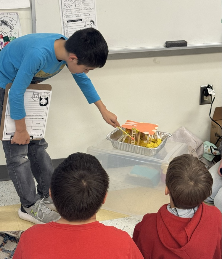 students building a model house 