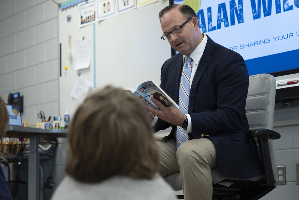 Alan Wilson reading book