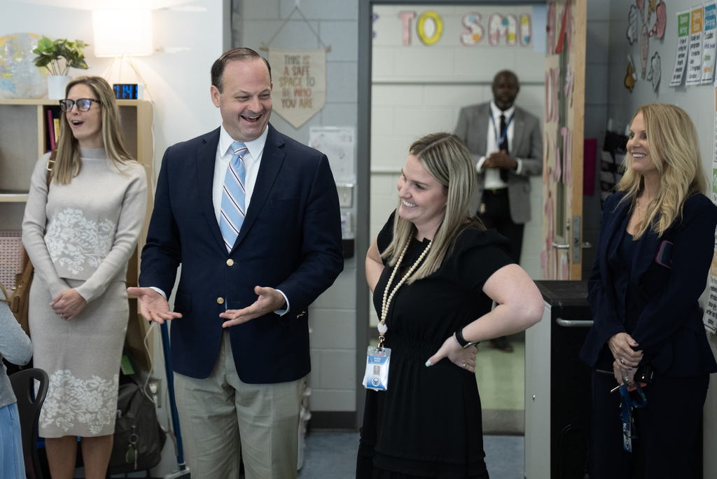 Alan Wilson with BCE teacher and principal