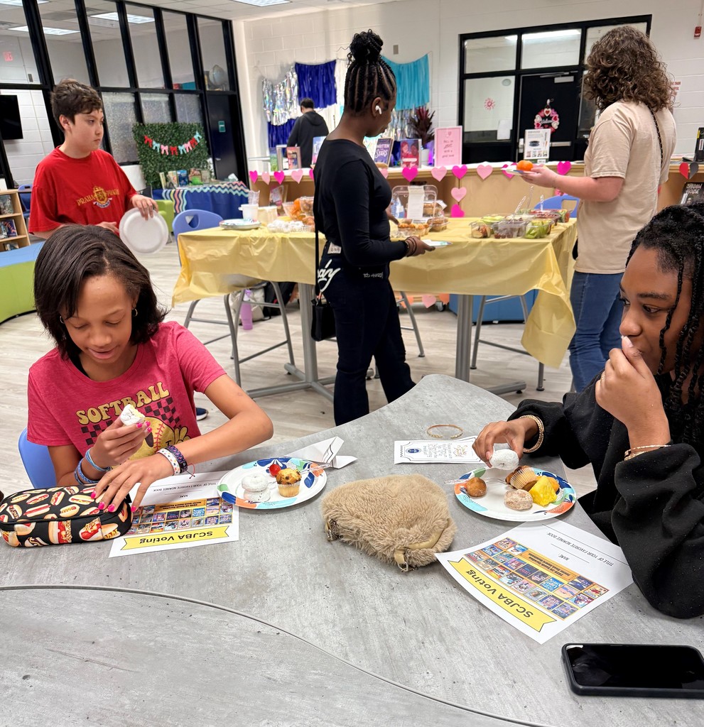 Students enjoy discussing books  over breakfast.