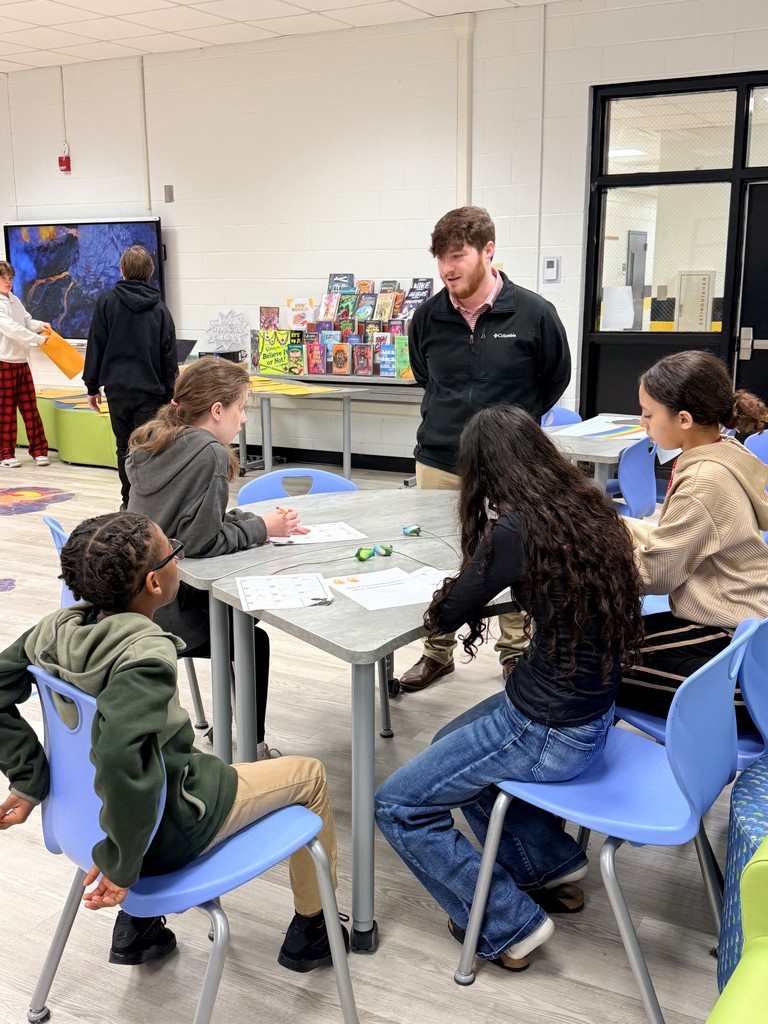 Students enjoy a fun interactive game in the school library.