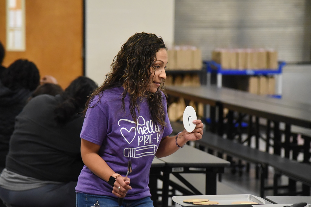 teacher demonstrating activity