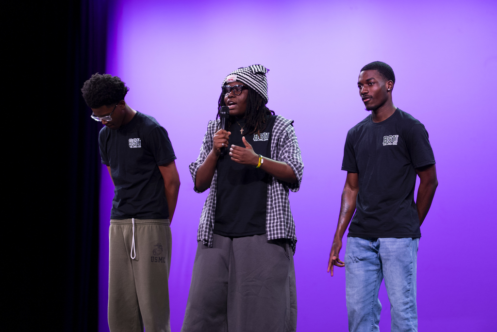 student speaking before premiering film