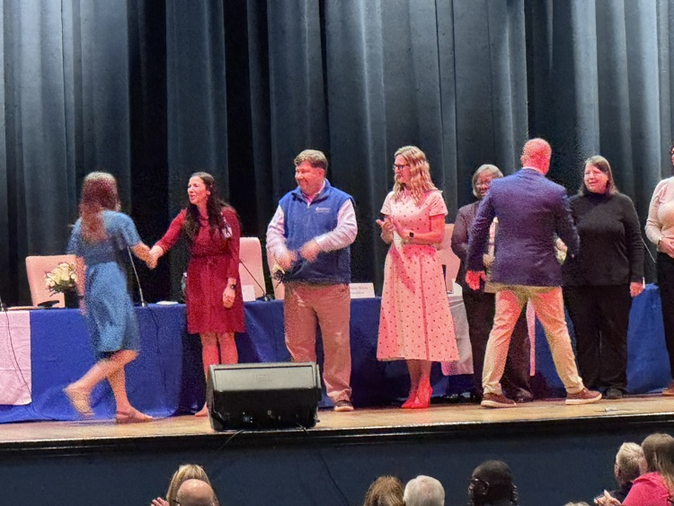 Lockwood walking across stage