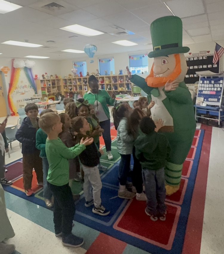 student talking with leprechaun