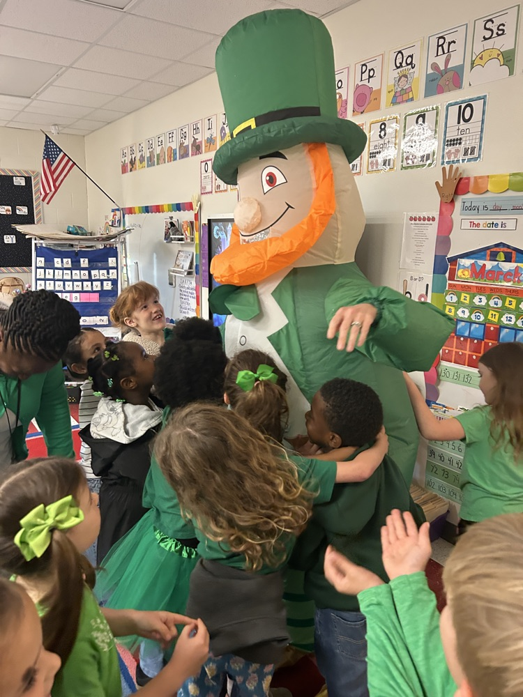 student hugging leprechaun 