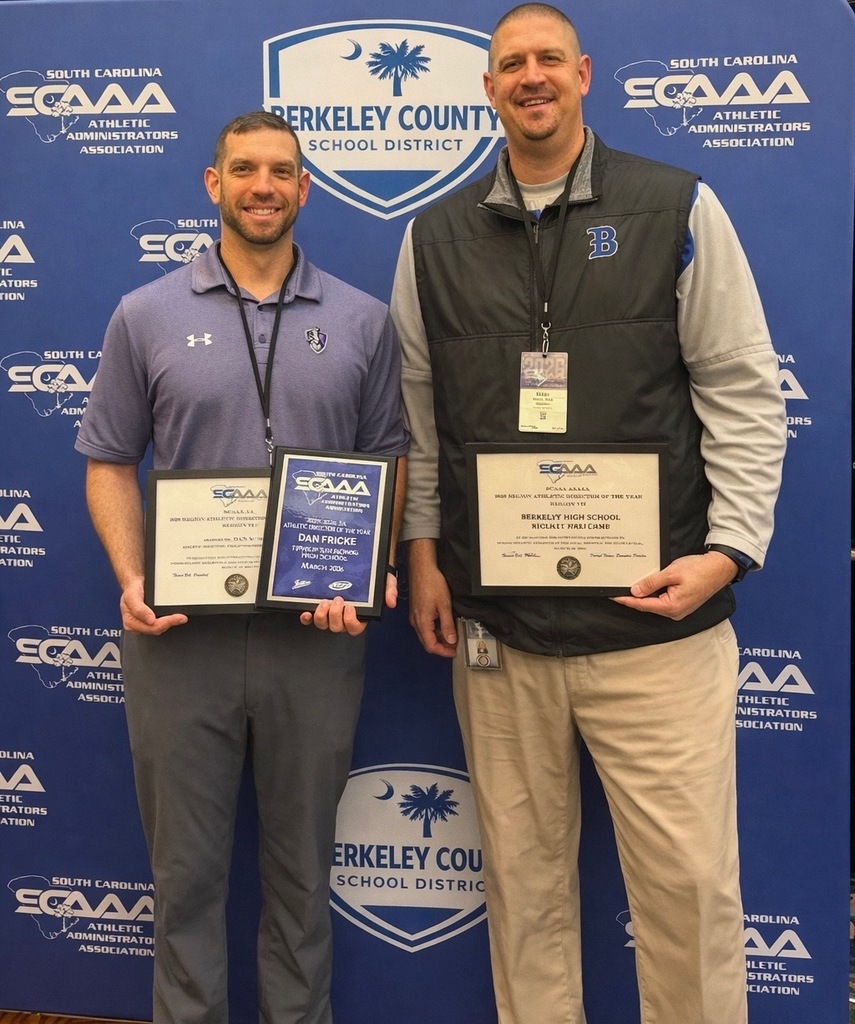 Dan Minkin and Brian Welch with trophies