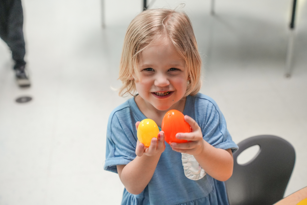 Sanagree Elementary student holding Easter eggs