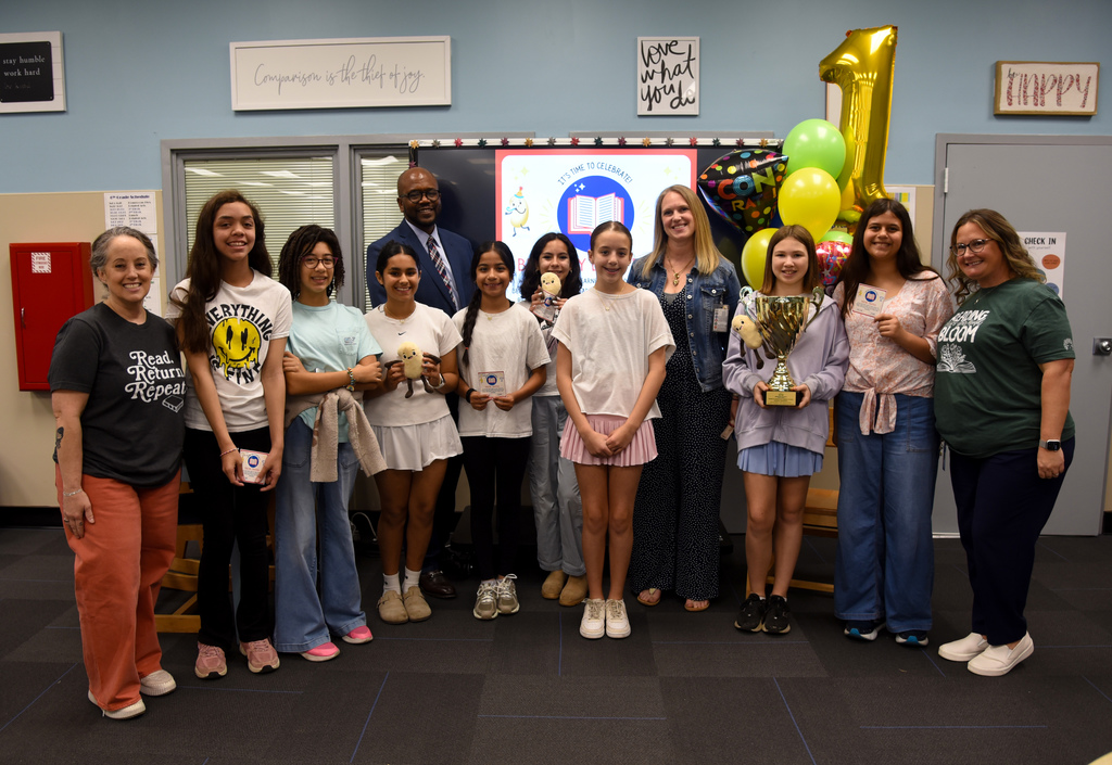 Marrington Middle School Top 10 readers and school administration with Beanstack Star School trophy