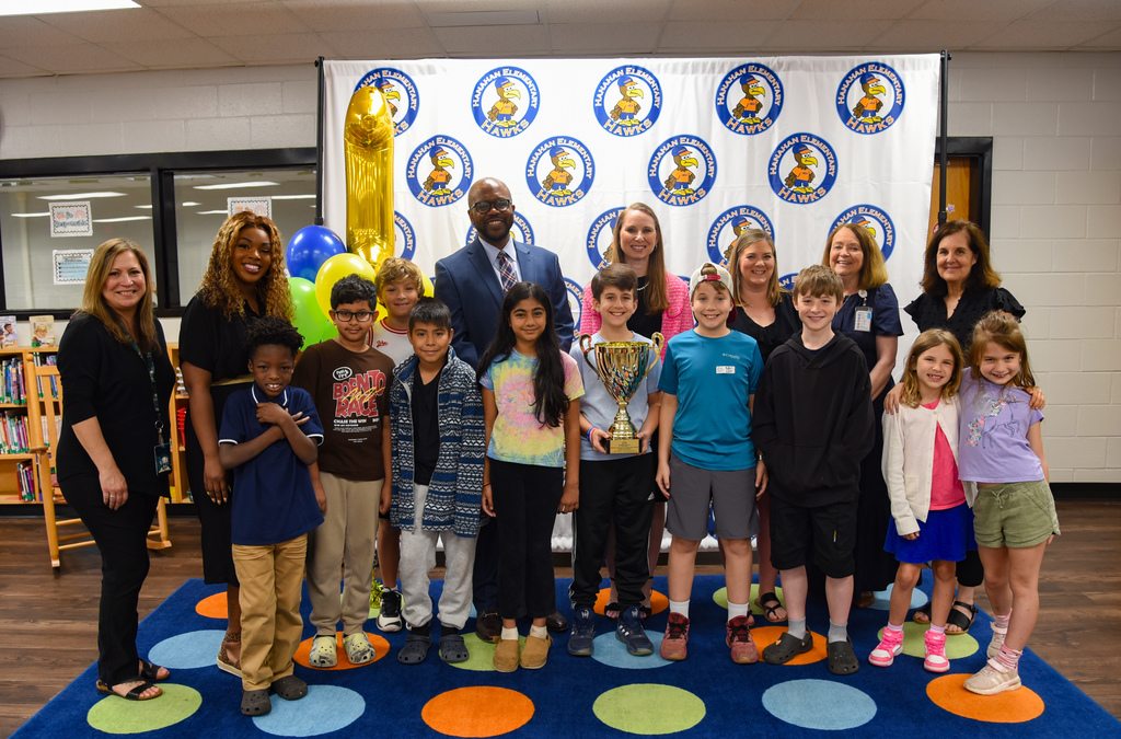 Hanahan Elementary Top 10 readers and school administration with Beanstack Star School trophy