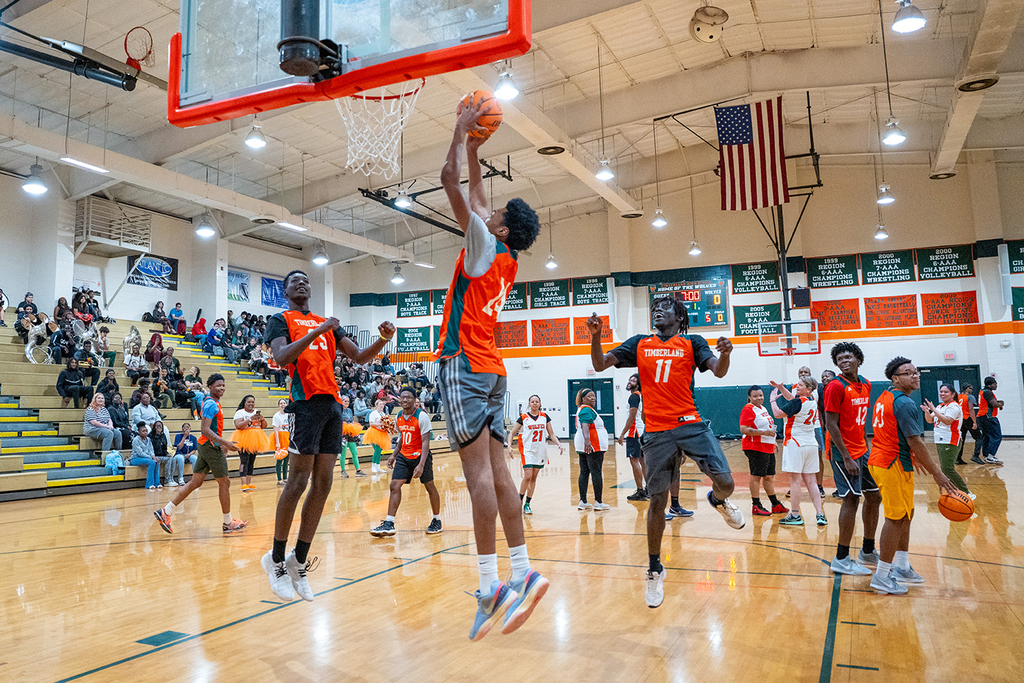student making a basket