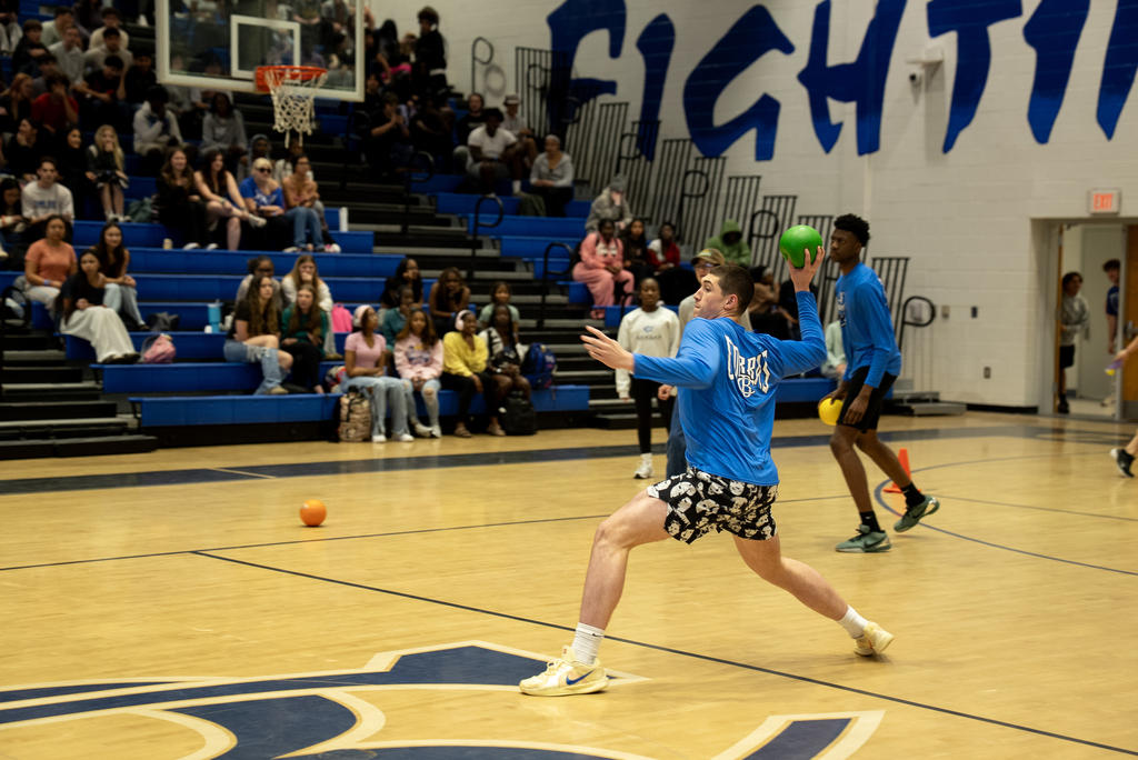 student throwing dodgeball