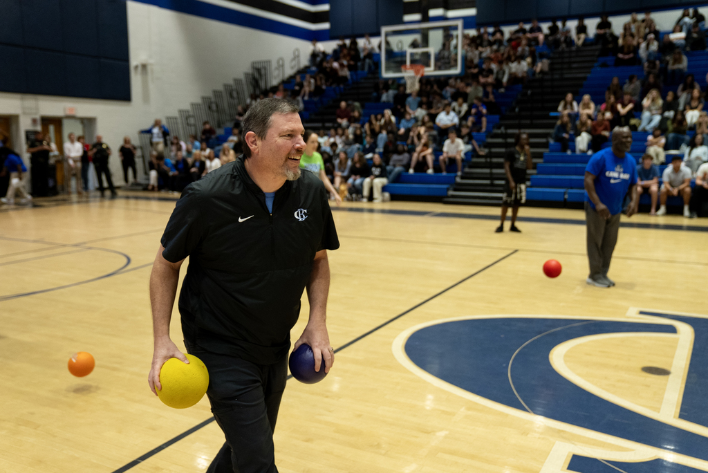 teacher playing dodgeball