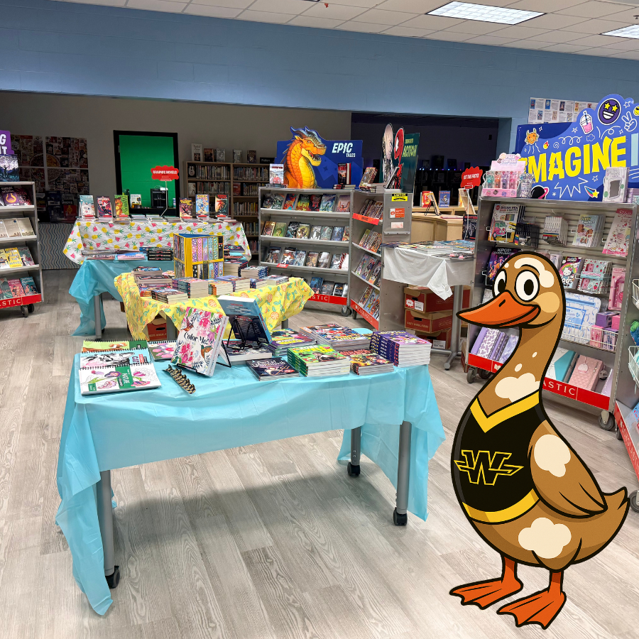 Goose in a school library book fair. 