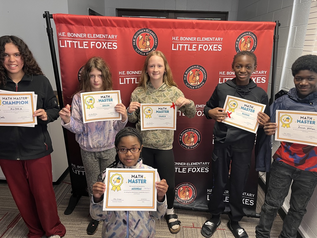 Six children hold certificates in front of a banner with the words "Little Foxes" and a logo.