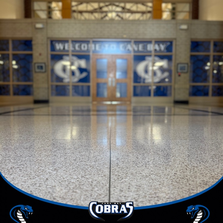 Freshly polished floors inside Cane Bay High School leading to the “Welcome to Cane Bay” entrance.