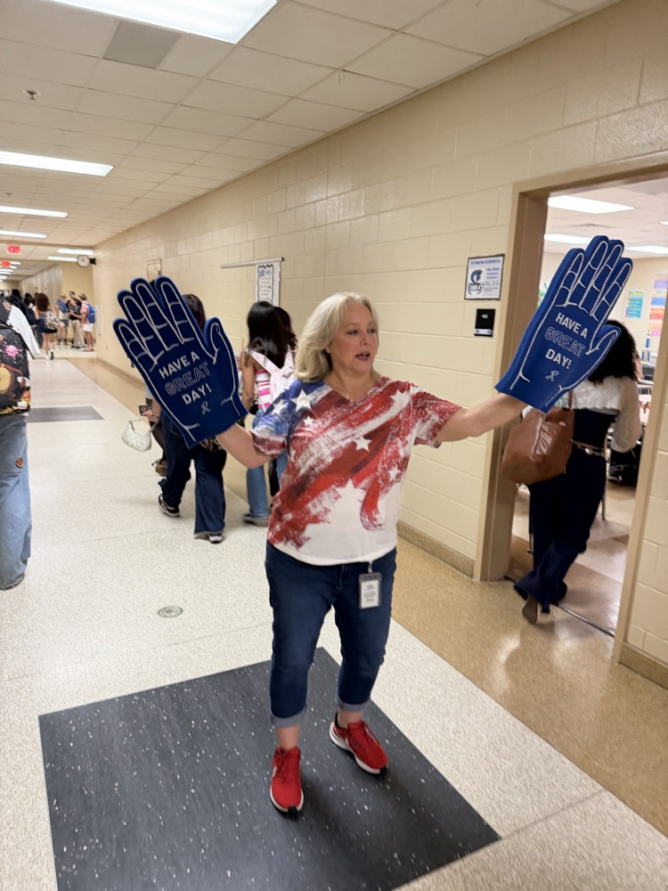 A cobra Staffulty member giving high fives!