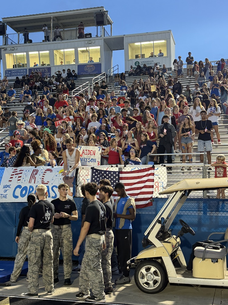 Cane Bay students fill the stands in red, white, and blue for the football game against Stratford.