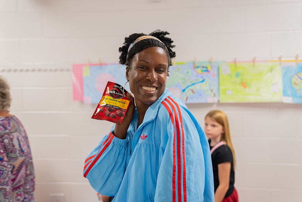 teacher holding up snack
