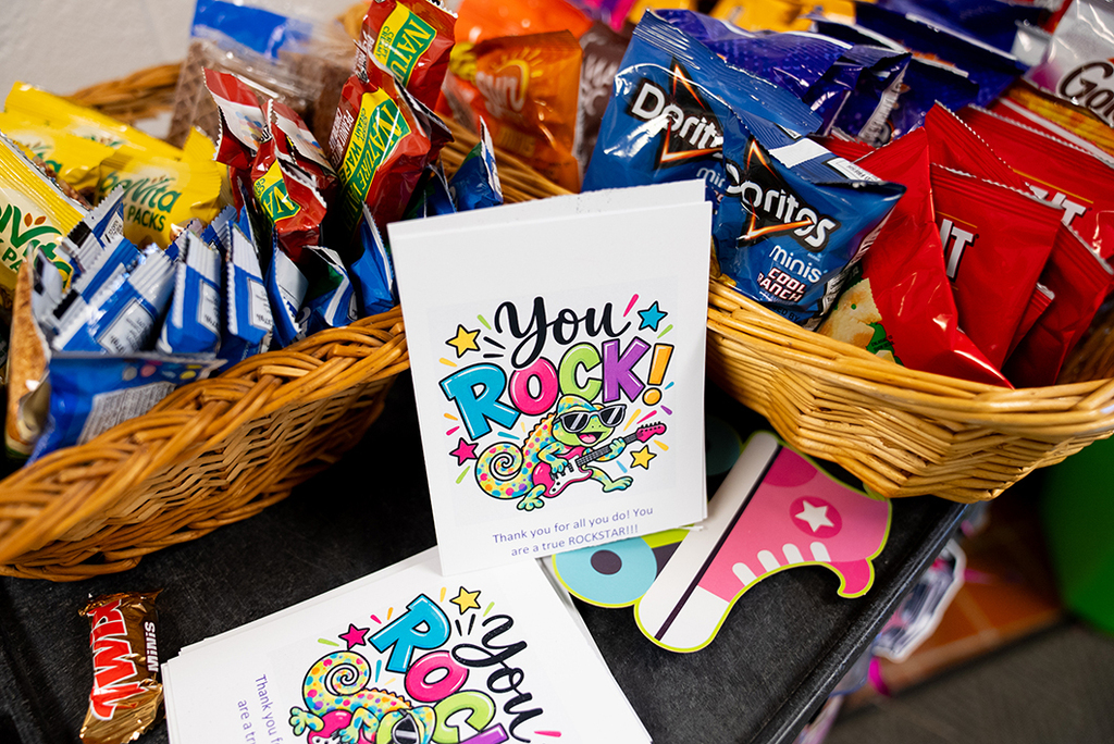 snack cart with sign reading "you rock!"