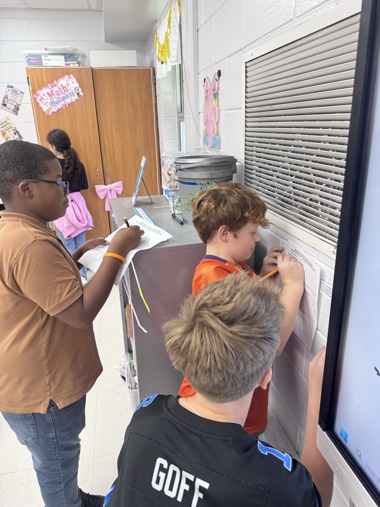 Students went on the Buck Trail as they worked together to hunt for clues in this integer station!