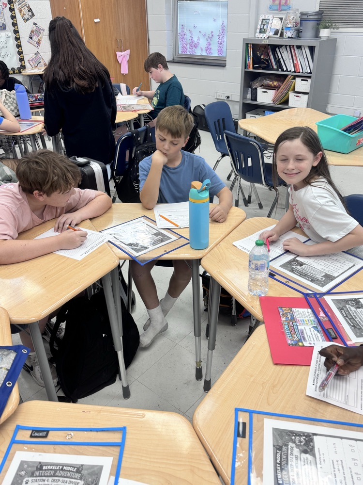 Students worked through dividing integers here, ordering quotients, and finding equivalent equations while justifying their thinking!