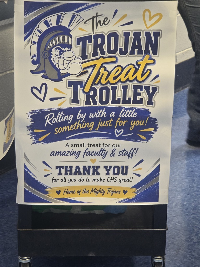 A sign reads "The Trojan Treat Trolley" with a mascot and a message thanking faculty and staff.