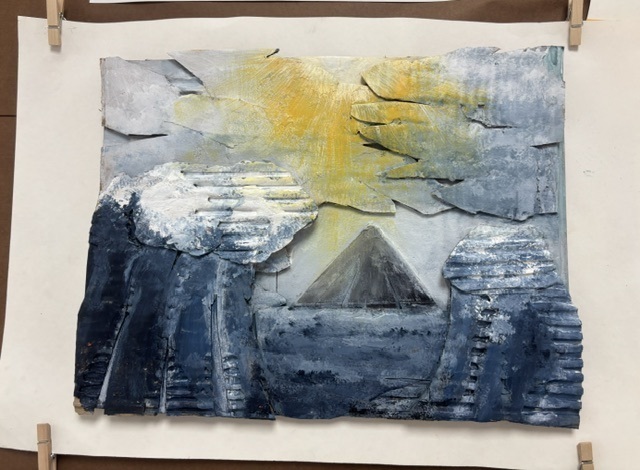 Mountain art work and post of art work made with cardboard