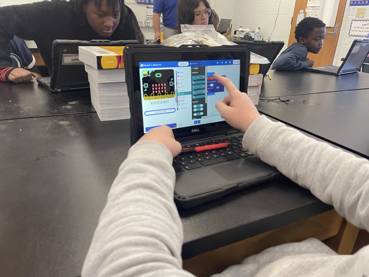 Student using coding software for  the Microbit