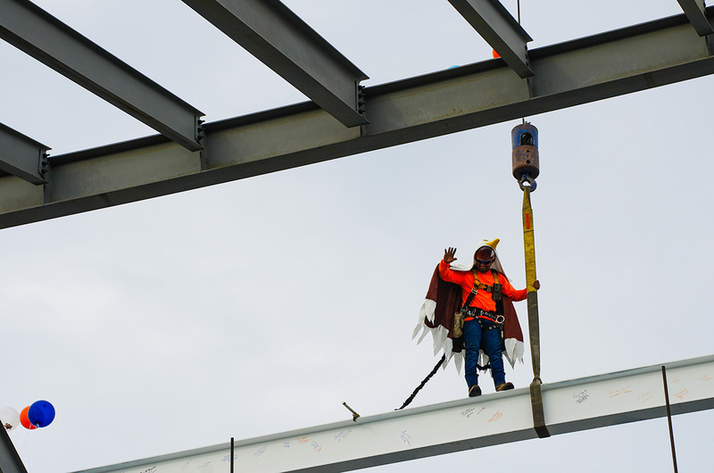 construction worker dressed as hawk