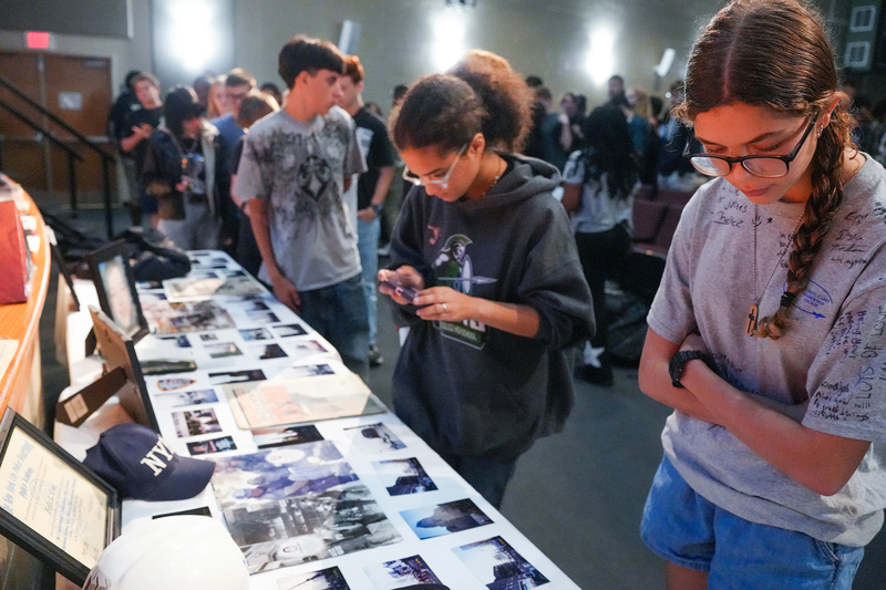students examining table with 9/11 primary sources