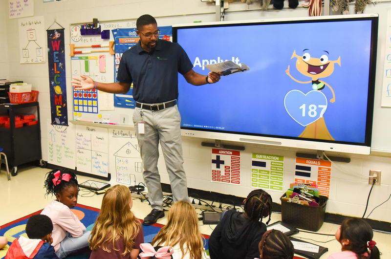 employee reading at WES