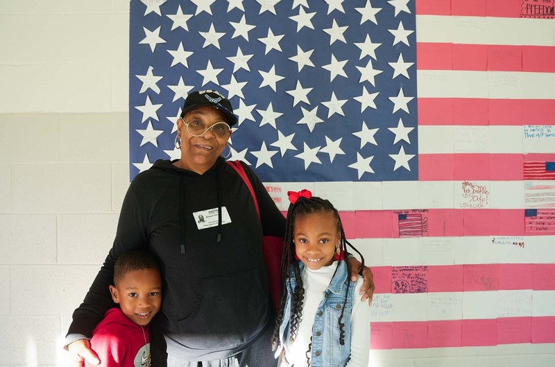 visiting veteran with grandchildren