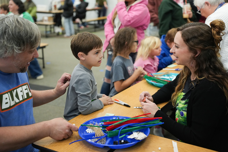 staff with little boy and dad