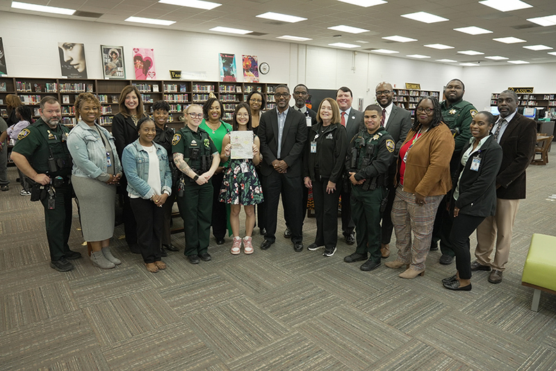 GCH student with family and winning design