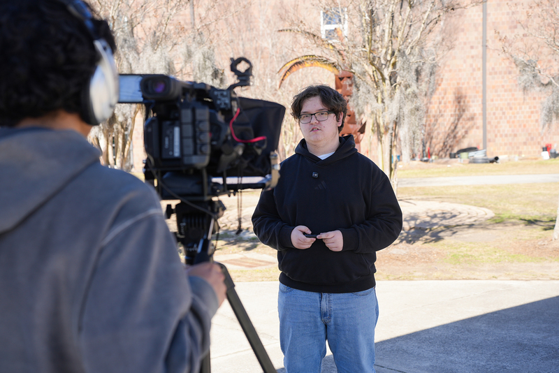 boys shooting with camera